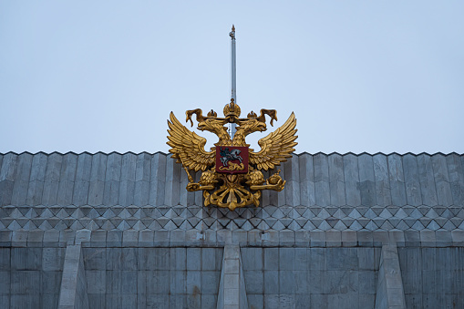 coat of arms of the russian federation on the facade of the Kremlin Palace of Congresses