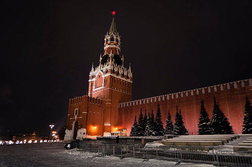 Spasskaya Tower of Moscow Kremlin at Red Square against the background of the night sky in Moscow. Russia