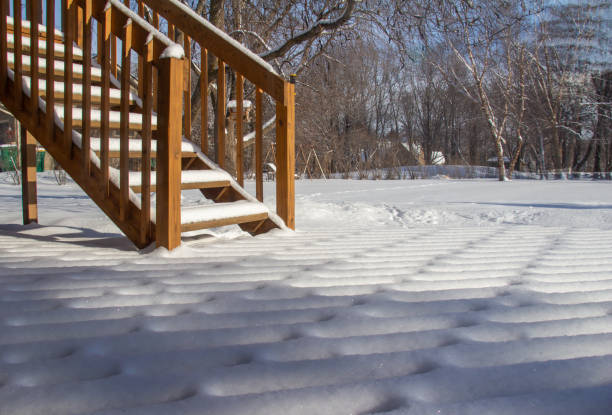 istock Geometric snow designs on a wooden deck 1366907728