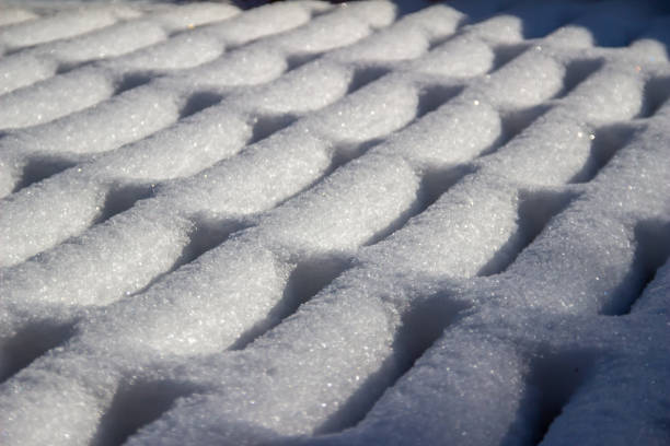 istock Texture background of snow designs on a wooden deck 1366907742