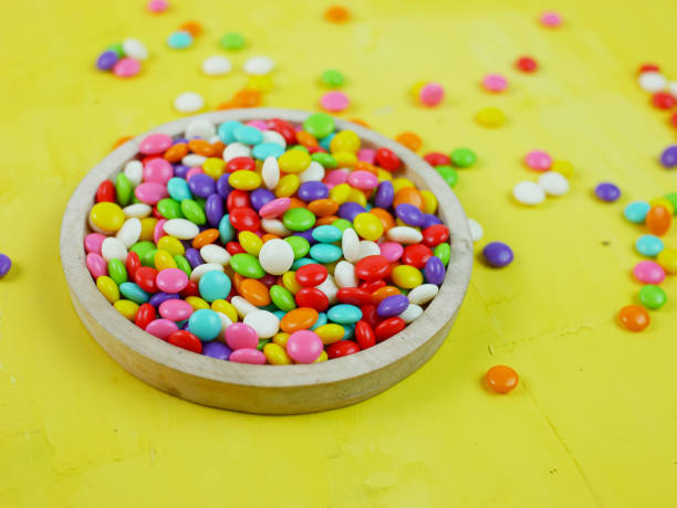 istock Colorful sweet candy. rainbow candy sprinkles. 1366913354