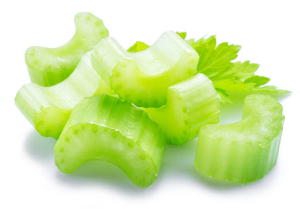 istock Pile of celery ribs and cuts isolated on white background. 1366923032