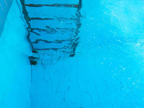 istock stairs in swimming pool underwater. Abstract. 1366923217
