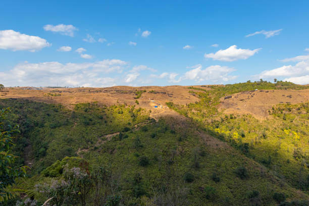 istock yellow grass mountain range with bright blue sky at morning from flat angle 1366923839