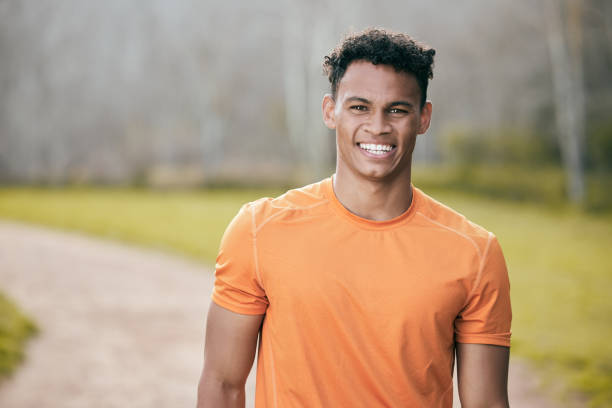 istock Shot of a handsome young man standing alone outside during his workout 1366925976