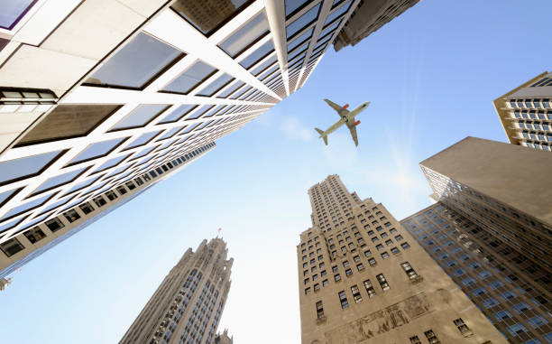 istock Airplane flying over Downtown Chicago. 1366927195