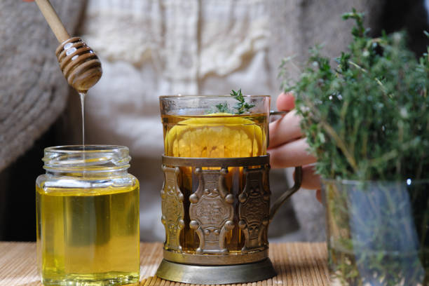 istock Hot tea with lemon, thyme and honey 1366934045