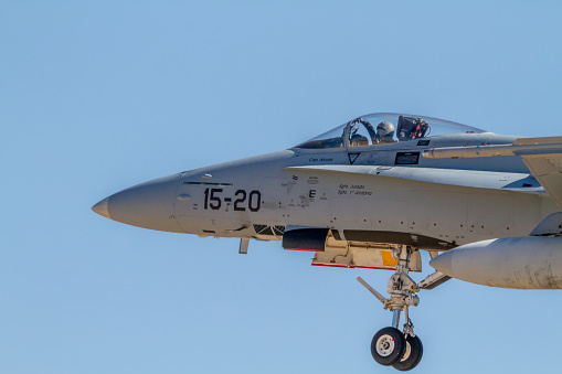 Zaragoza, SPAIN - July 16, 2021 - A single-seat FA-18A+ Hornet fighter jet belonging to the Zaragoza military base of the Spanish air force lands at Zaragoza airport after a training mission.