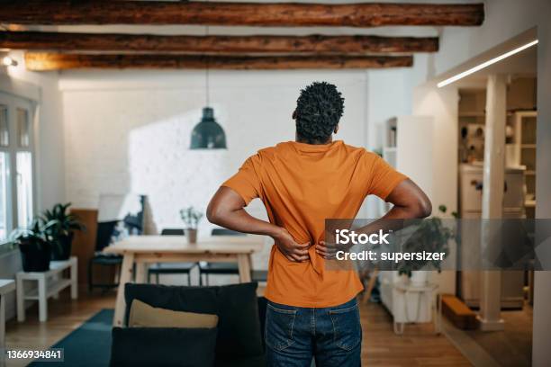 Young Africanamerican Man Having Pain Stock Photo - Download Image Now - Backache, Kidney - Organ, Pain