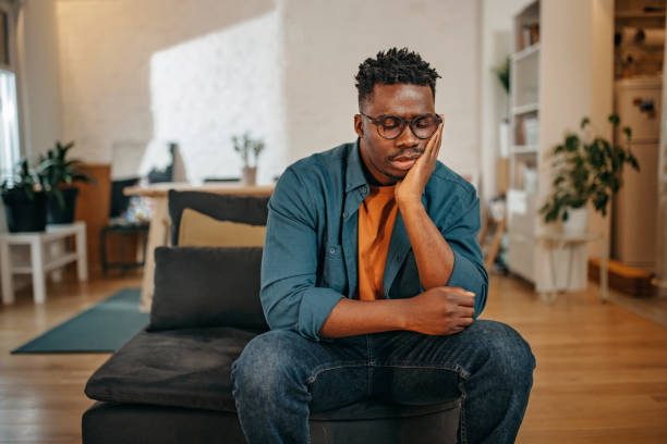 istock Young black man having pain 1366934903