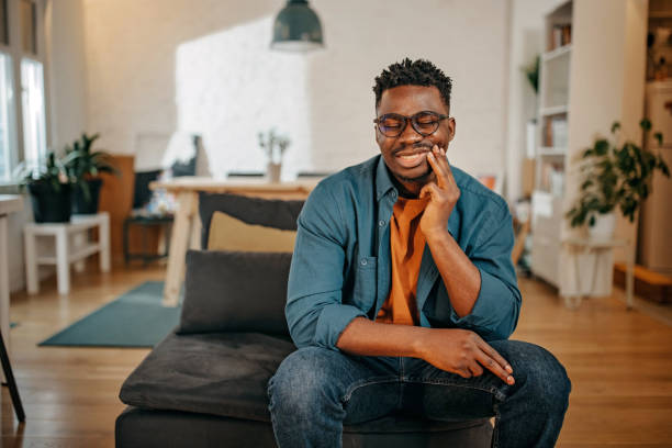 istock Young black man having pain 1366934904
