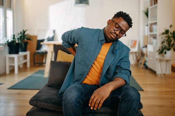 istock Young black man having pain 1366934976