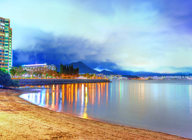 istock Sandy beach with seaside promenade. 1366935176
