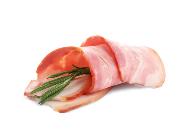 istock Fresh raw bacon slice with rosemary on white background 1366938994