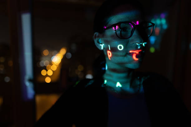 istock Woman portrait with light effects and reflection 1366944074