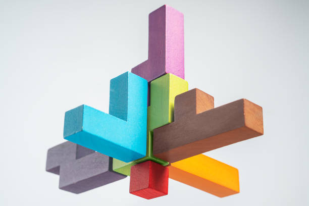 istock Abstract construction from wooden blocks. The concept of logical thinking. 1366944829