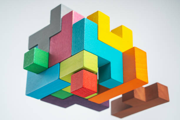 istock Abstract construction from wooden blocks. The concept of logical thinking. 1366944830