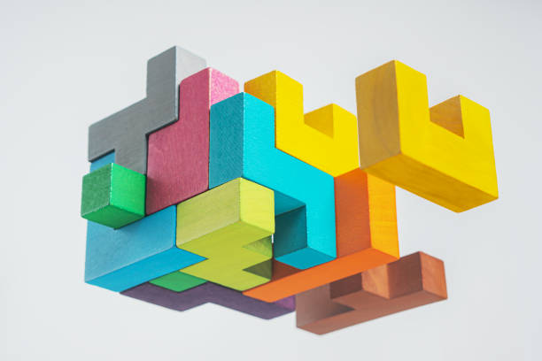 istock Abstract construction from wooden blocks. The concept of logical thinking. 1366944831
