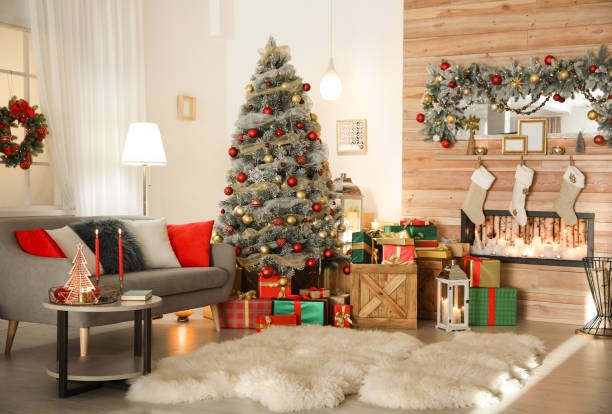 istock Beautiful Christmas tree in living room. Festive interior 1366944865