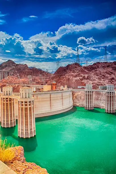 Photo of Modern Energetics Concepts. Hoover Dam and Penstock Towers in Lake Mead of the Colorado River on Border of Arizona and Nevada