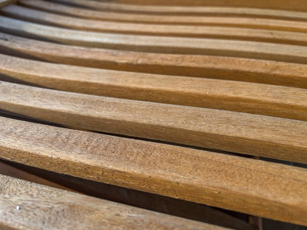istock Light wooden beams with spacing. 1366945545