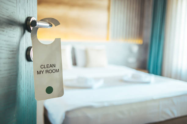 istock Opened door of hotel room. 1366946907