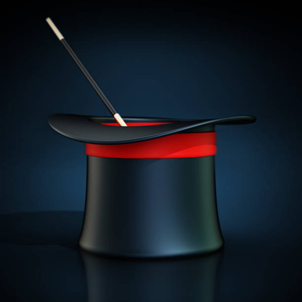 Magician top hat and wand isolated on black.