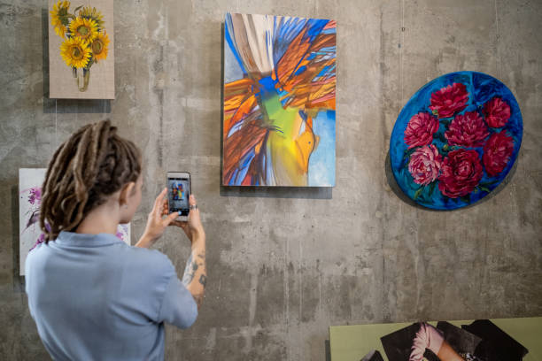 istock Woman visiting art exhibition 1366948704