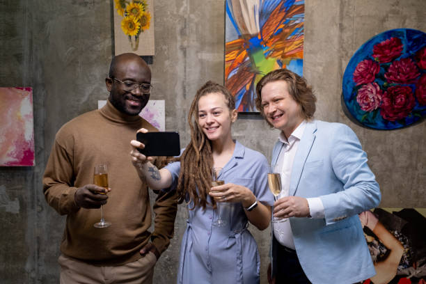 istock People making selfie portrait in art gallery 1366948728