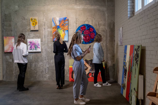istock People visiting exhibition in art gallery 1366948739