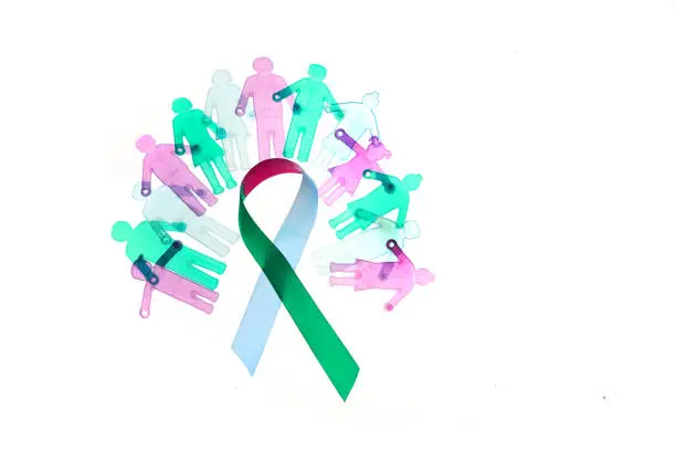 Rare Disease Day Background. Colorful awareness ribbon with group of people with rare diseases
