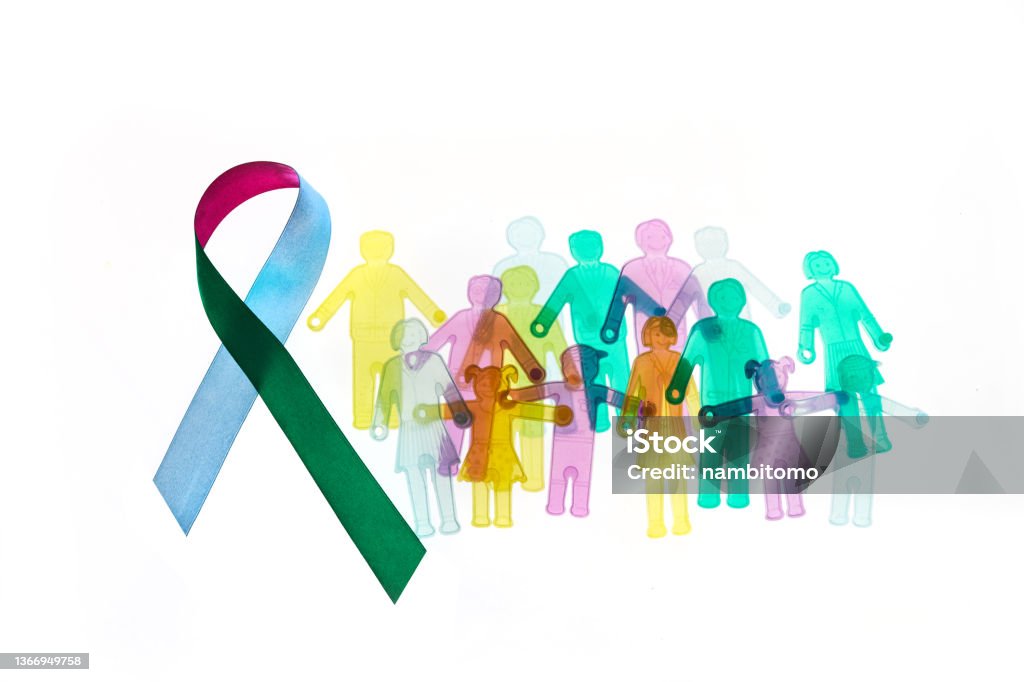 Rare Disease Day Background. Colorful awareness ribbon with group of people with rare diseases. Rare Disease Day Background. Colorful awareness ribbon with group of people with rare diseases Endangered Species Stock Photo