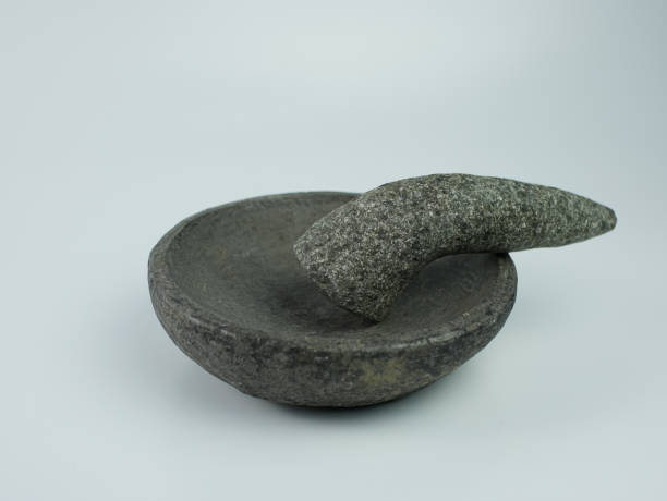 istock Indonesian traditional mortar and pestle isolated on a white background 1366951853