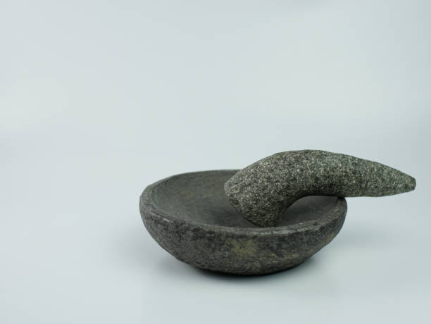 istock Indonesian traditional mortar and pestle isolated on a white background 1366951854