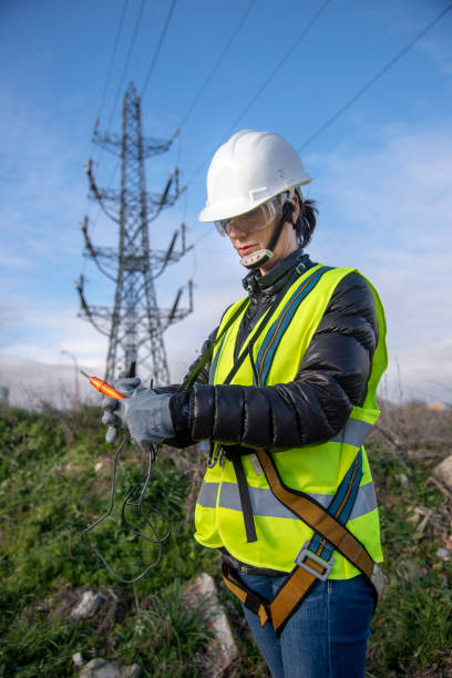 istock WOMAN WITH SAFETY EQUIPMENT AT WORK 1366952030