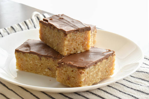 istock Chocolate caramel rice crispy treats on a plate. 1366954156