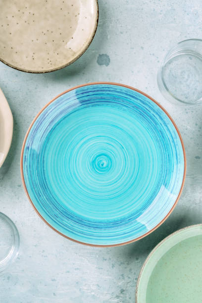 istock Modern tableware with a blue plate, shot from the top 1366954197