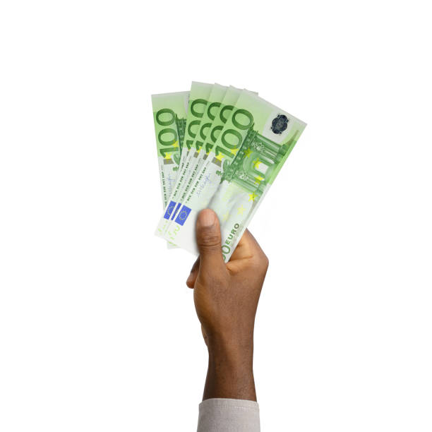 istock Black Hand holding 3D rendered 100 Euro notes isolated on white background 1366954438