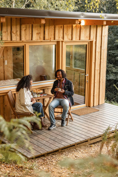 istock Hispanic Couple Having Breakfast Outdoors 1366955538