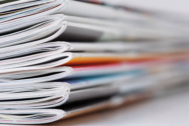 istock Stack of magazines that progressively blurs toward the right 1366956400
