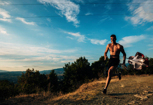 istock A runner silhouette athlete man trains in the high mountains 1366958067