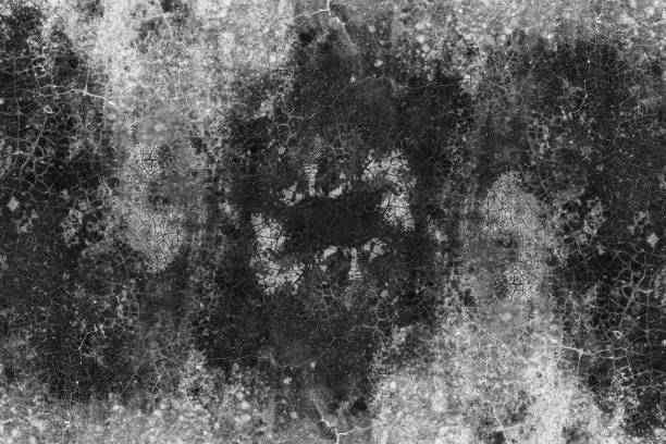 istock Abstract textured old abandoned monochromatic concrete wall surface for background 1366959311