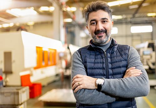 Portrait of a handsome small business owner smiling