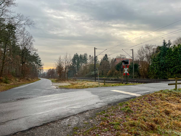 A road junction at the railway tracks in Germany.