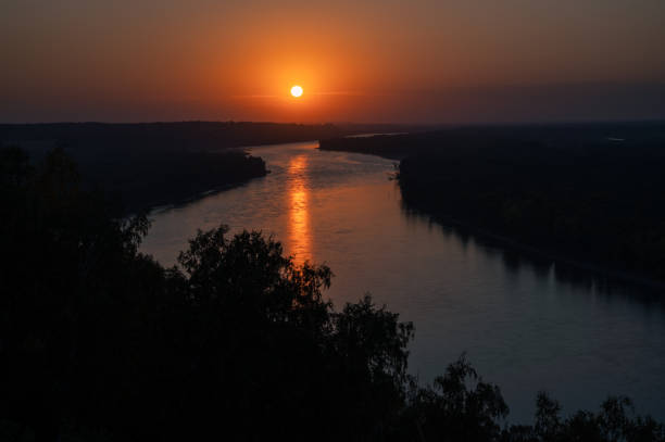 istock View of river landscape in sunny summer evening 1366964032