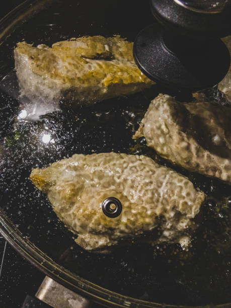 istock Chicken breast fillets on frying in a pan. 1366964858