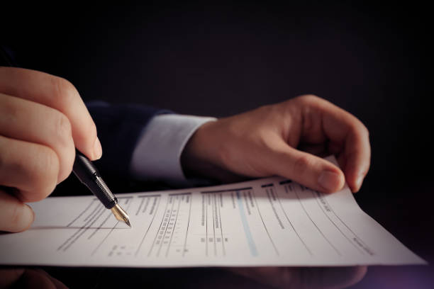 istock Lawyer working in the office. Singing agreement 1366965393