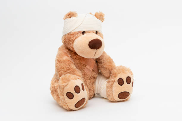 istock Teddy bear with bandage, medical care concept 1366965465