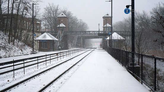 Winnetka, IL, USA. Looking down the tracks on a snowy day at the Winnetka Metra train station in suburban Chicago.
