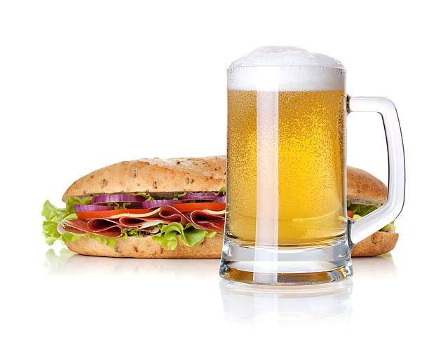 istock Cold lager beer glass and long sandwich 136696679